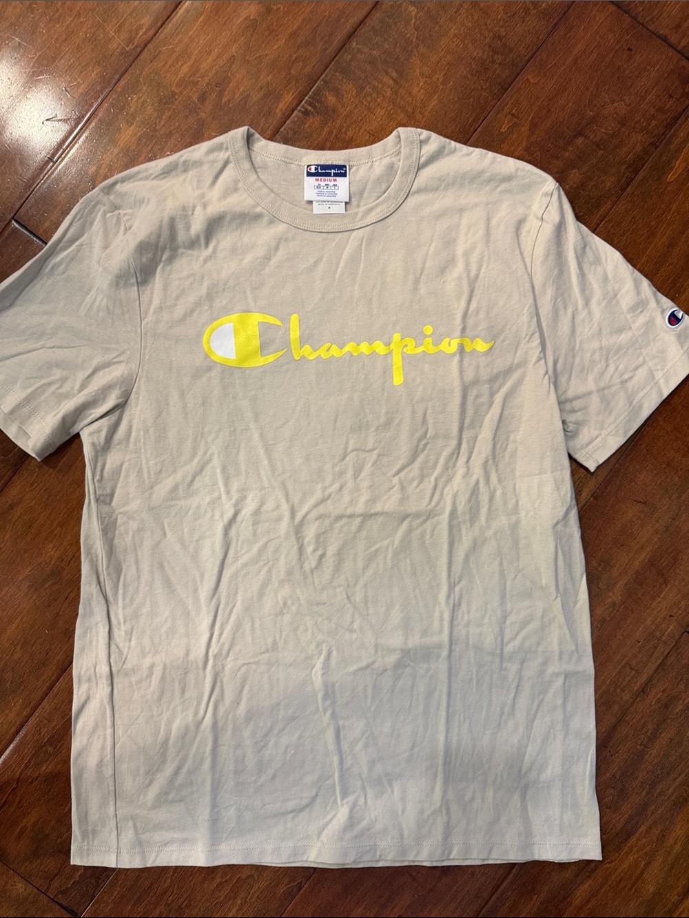 Like New! Champion Men’s Beige Short Sleeve Tee with Yellow Logo